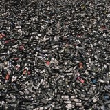 Discarded Cell Phones in a Garbage Dump